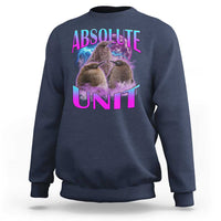 Navy crewneck sweatshirt with penguin graphic and “ABSOLUTE UNIT” print on chest.