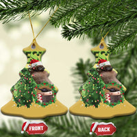 Set of gold Christmas tree-shaped ornaments with PESTO penguin, front and back labels