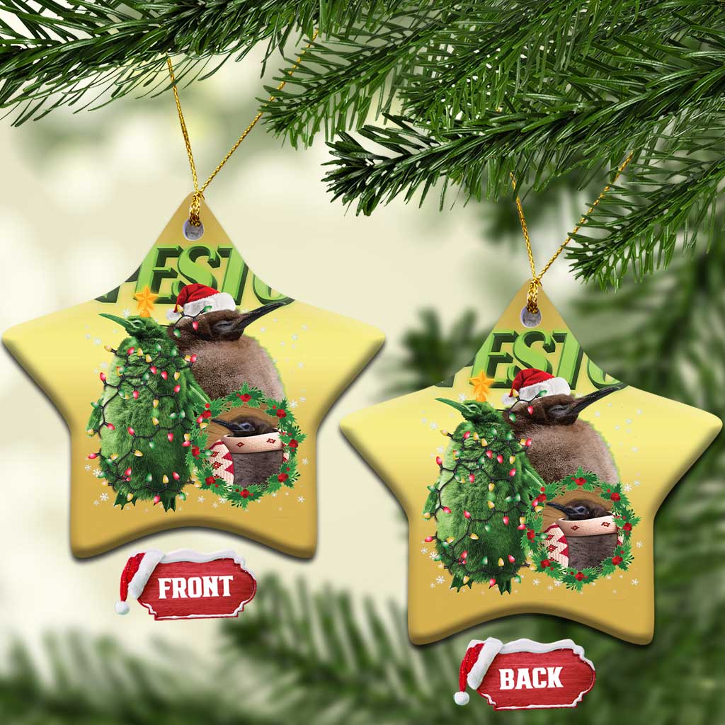 Gold star-shaped Christmas ornament with PESTO penguin, wreath, and gift bag artwork