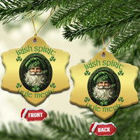 Gold heart-shaped Christmas ornament set with green leprechaun portrait hanging on branches
