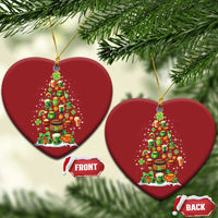 Pair of red heart-shaped Irish Christmas ornaments with illustrated Christmas tree and shamrocks; front/back tags.