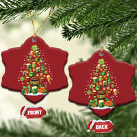 Pair of red four-point star-shaped Irish Christmas ornaments with illustrated Christmas tree and shamrocks; front/back tags.