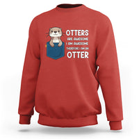 Red crewneck sweatshirt with otter graphic and slogan front print