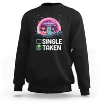 Black crewneck sweatshirt with 'SINGLE TAKEN' alien UFO Valentine graphic