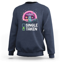 Navy crewneck sweatshirt with 'SINGLE TAKEN' alien UFO Valentine graphic