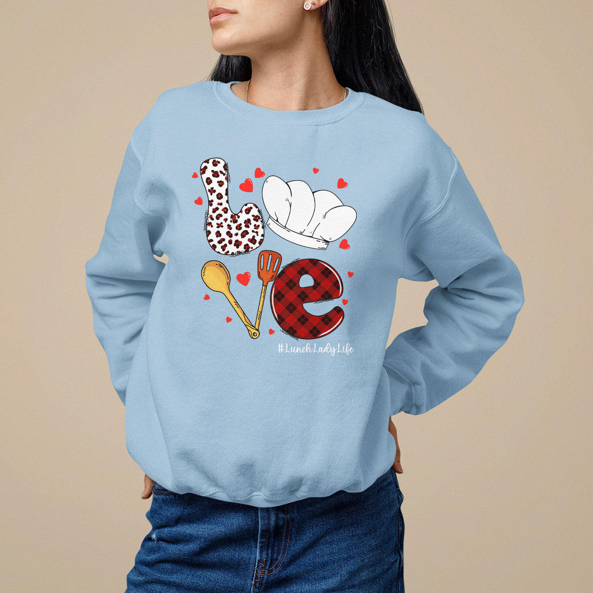 Women's light blue sweatshirt with lunch-themed graphic and hearts, hashtag #LunchLadyLife