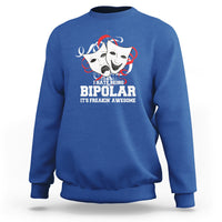 Royal blue crewneck sweatshirt with bipolar graphic and quote printed on the front