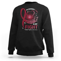 Black awareness sweatshirt with red ribbon and heart “fight” graphic on front