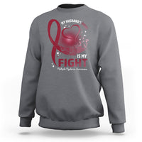 Charcoal gray awareness sweatshirt with red ribbon and heart “fight” graphic on front