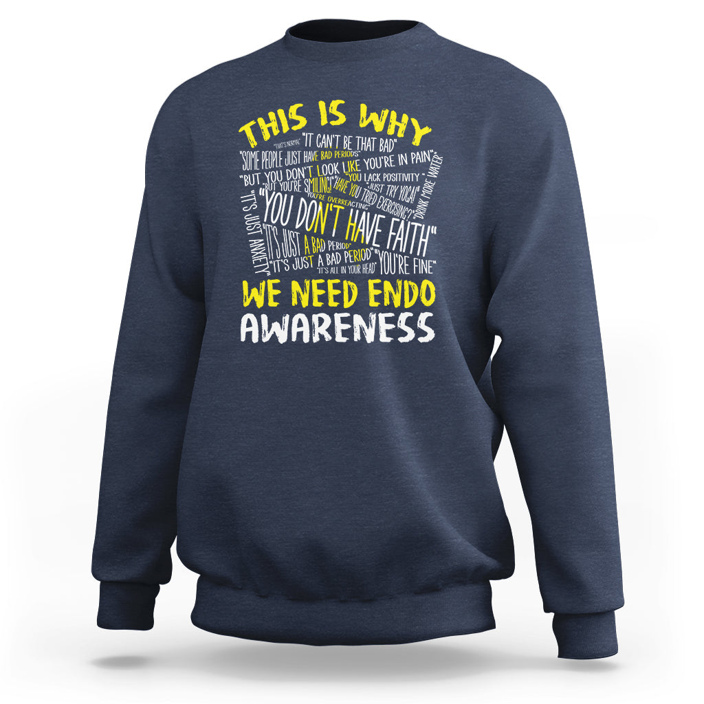 Navy sweatshirt with “We Need Endometriosis Awareness” back graphic, crew neck.