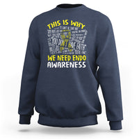 Navy sweatshirt with “We Need Endometriosis Awareness” back graphic, crew neck.