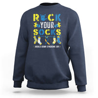 Navy crewneck sweatshirt with colorful “Rock Your Socks” sock graphic on back