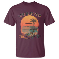 Maroon lake-themed T-shirt with pontoon boat and palm tree graphic