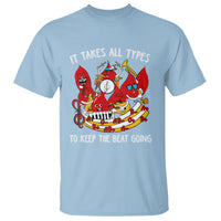 Phlebotomist graphic tee in light blue with colorful medical-themed cartoon front print
