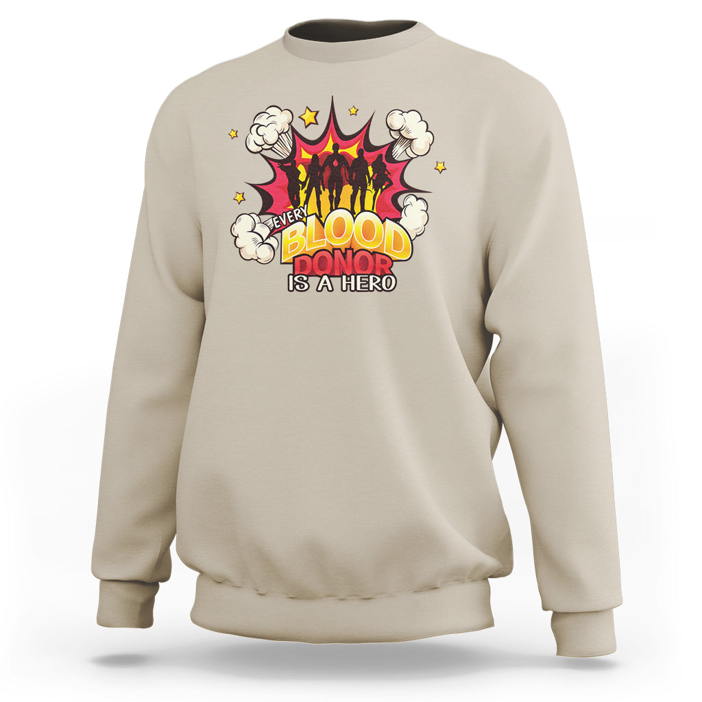 Sand sweatshirt with colorful “Blood Donor is a Hero” front graphic