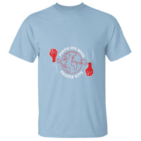 Light blue blood donor T-shirt with red globe and hands graphic, people give design