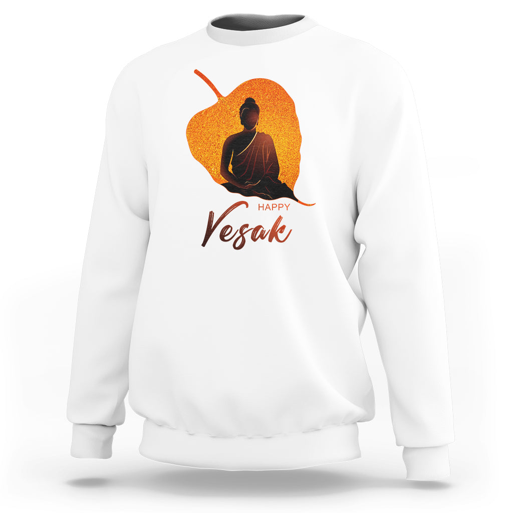 White sweatshirt with Buddha meditation graphic and 'Happy Vesak' lettering
