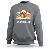 Charcoal crewneck sweatshirt with reindeer holding beer mugs graphic on chest