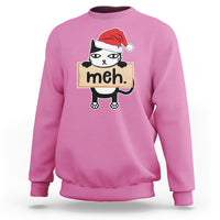 Azalea pink sweatshirt with cartoon black cat wearing Santa hat and “meh” sign front print.