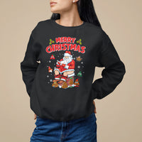 Black crewneck sweatshirt with 'MERRY CHRISTMAS' Santa graphic and cartoon ornaments