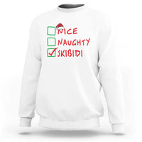 White Christmas sweatshirt with “NICE NAUGHTY SKIBIDI” graphic on chest