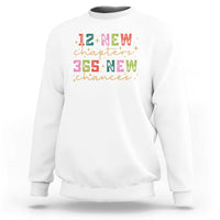 White crewneck sweatshirt with colorful "12 New chapters" and "365 New chances" graphic