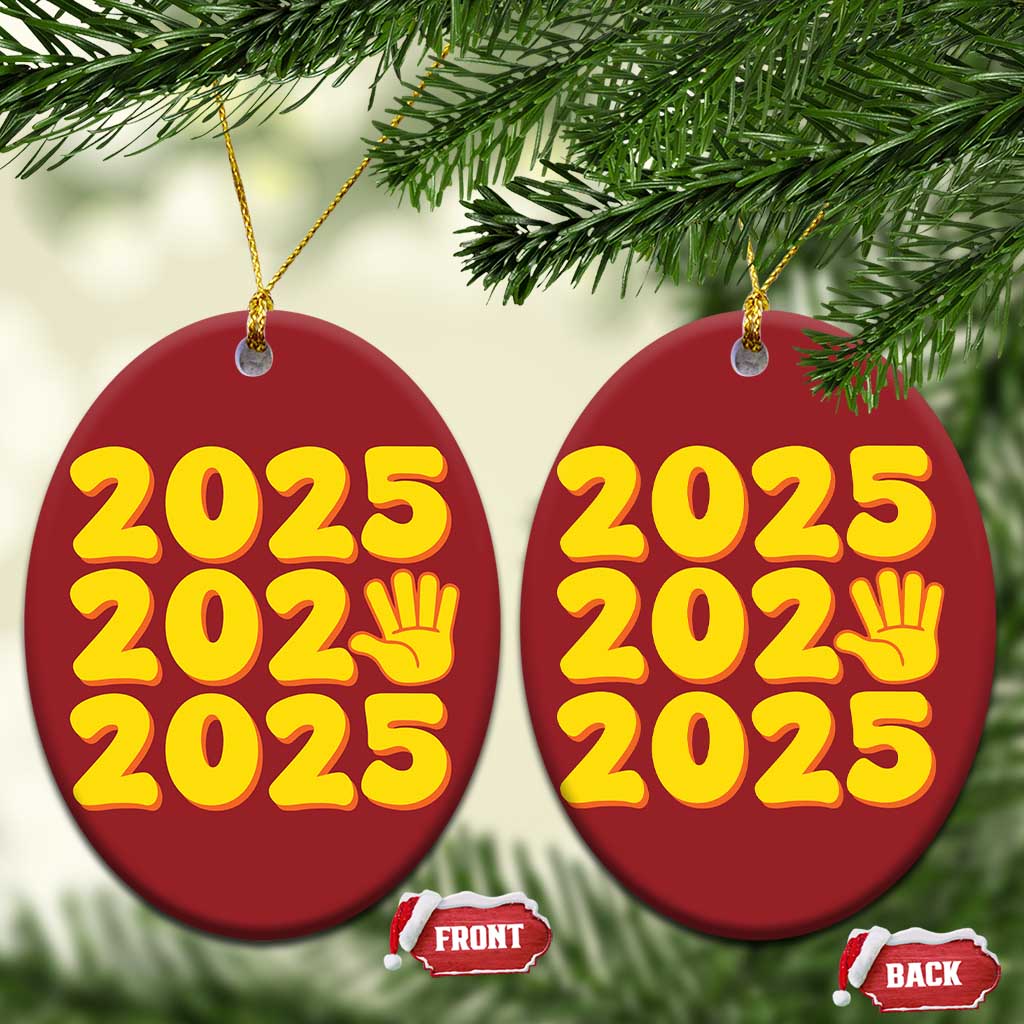 Two red round 2025 holiday ornaments with yellow “2025” and handprint icon