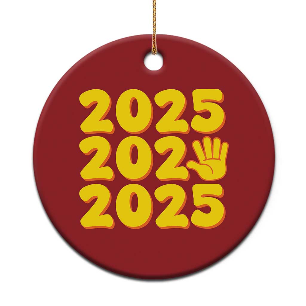 Red 2025 holiday ornament with yellow “2025” and handprint icon, round shape