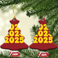 Red Christmas tree-shaped 2025 ornament with yellow “2025” and handprint icon