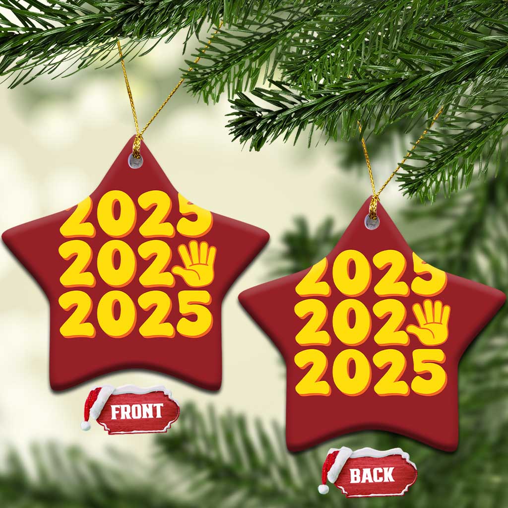 Red star-shaped 2025 ornament with yellow “2025” text and handprint icon