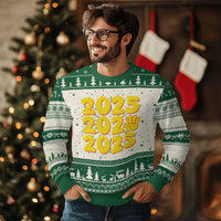 Green 2025 ugly Christmas sweater with white tree stripe and yellow 2025 lettering