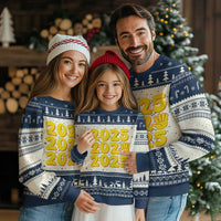 Blue and white 2025 ugly Christmas sweater with tree pattern and yellow 2025 text