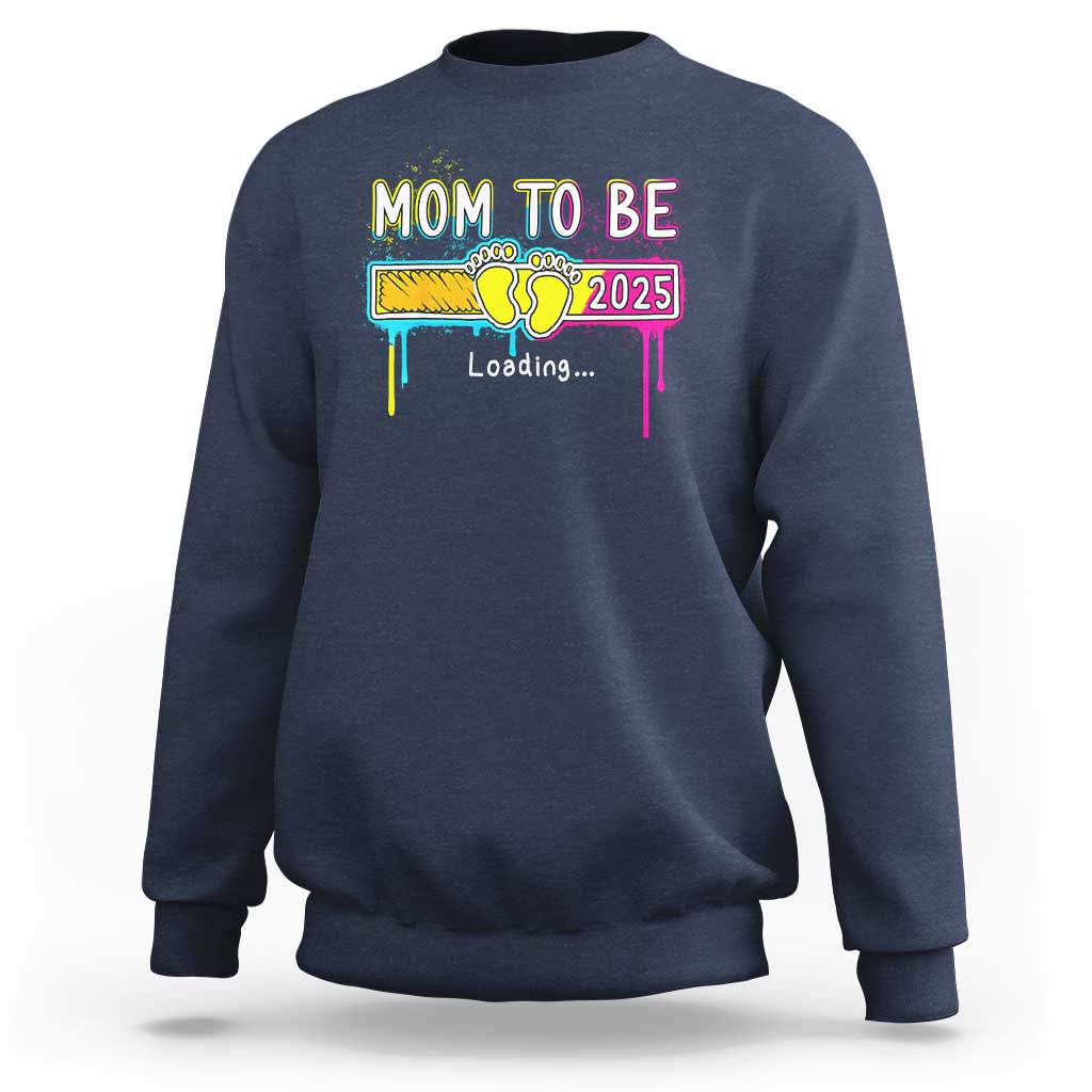 Navy mom-to-be sweatshirt with colorful “Mom to be 2025” loading graphic on front