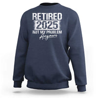 Navy crewneck sweatshirt with 'Retired 2025' and 'Not My Problem' graphic