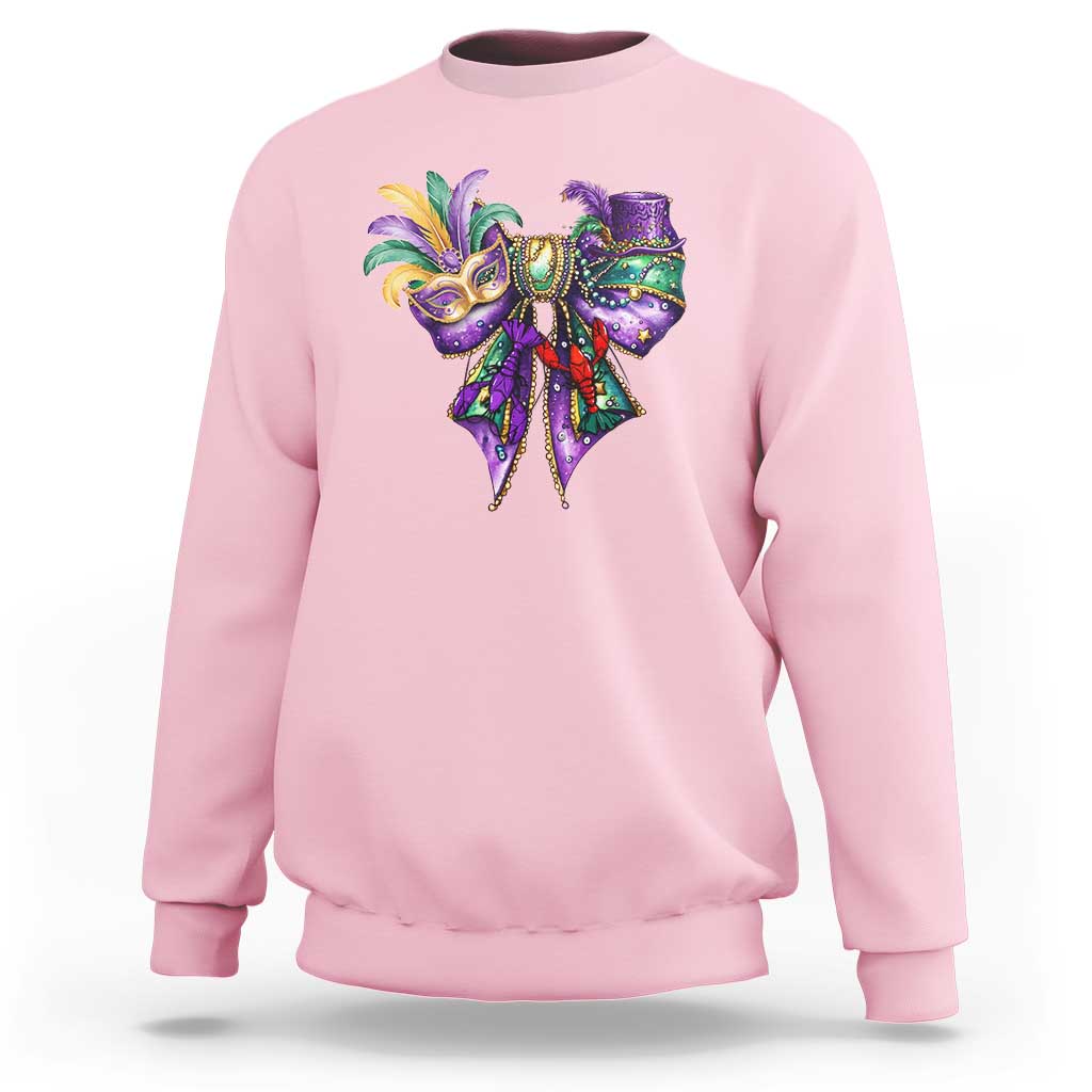 Light pink Mardi Gras sweatshirt with colorful jester-mask graphic on the chest