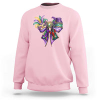 Light pink Mardi Gras sweatshirt with colorful jester-mask graphic on the chest