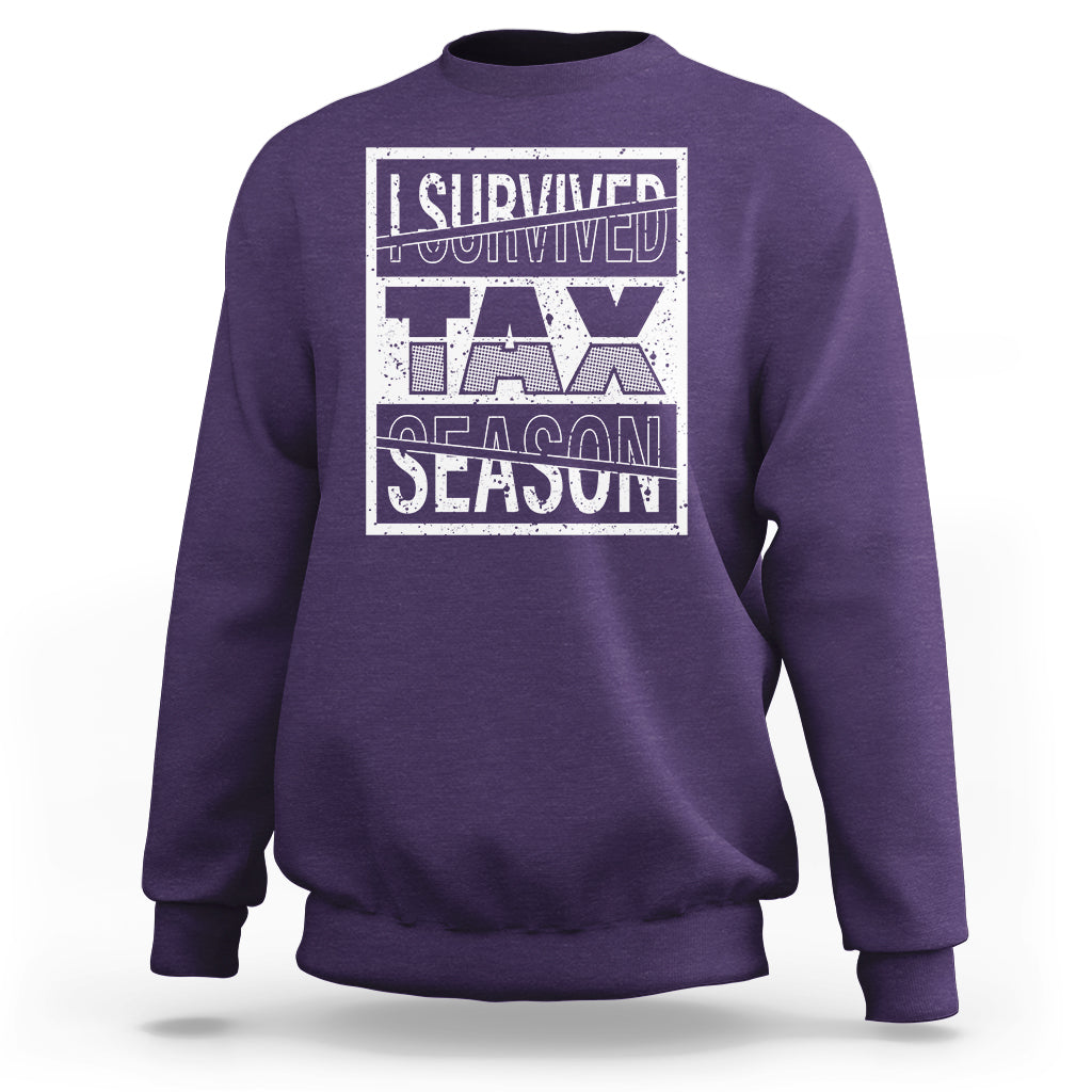 Purple crewneck sweatshirt with Survived Tax Season front graphic