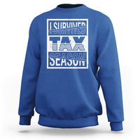 Royal blue crewneck sweatshirt with Survived Tax Season front graphic