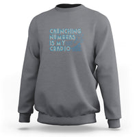 Medium gray crewneck sweatshirt with teal 'Crunching numbers is my cardio' graphic