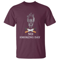 Maroon T-shirt with skull smoke graphic and "NO SMOKING DAY" print