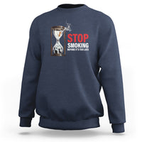 Blue anti-smoking sweatshirt with STOP SMOKING graphic on chest
