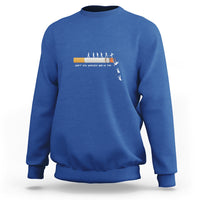 Royal blue long-sleeve sweatshirt with centered graphic and ribbed crewneck cuffs.