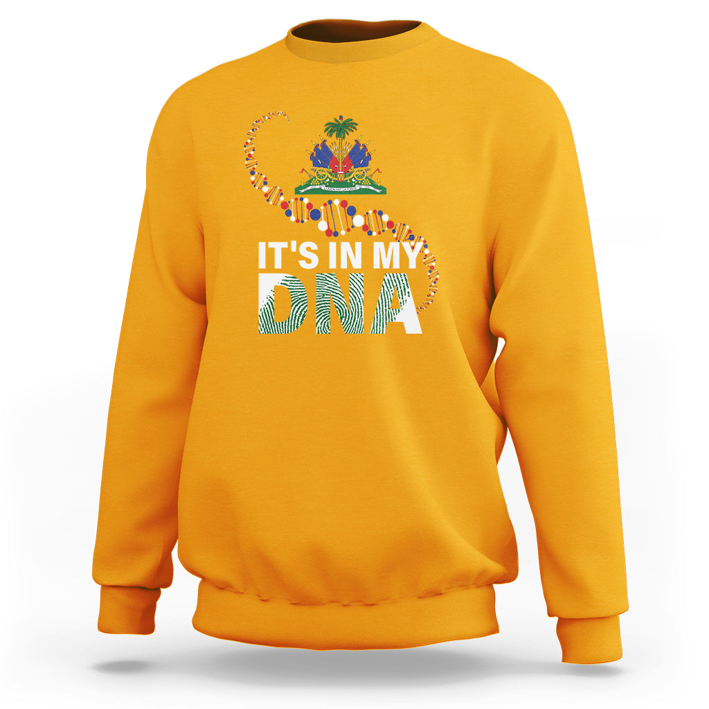 Gold crewneck sweatshirt with colorful “It’s in My DNA” graphic on chest