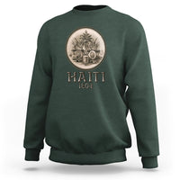 Dark forest green crewneck sweatshirt with front circular emblem and HAITI 1804 text.