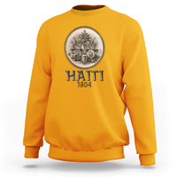Orange crewneck sweatshirt with front graphic medallion and text HAITI 1804.