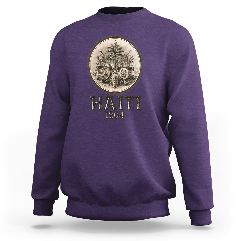 Purple crewneck sweatshirt with front circular emblem and HAITI 1804 lettering.