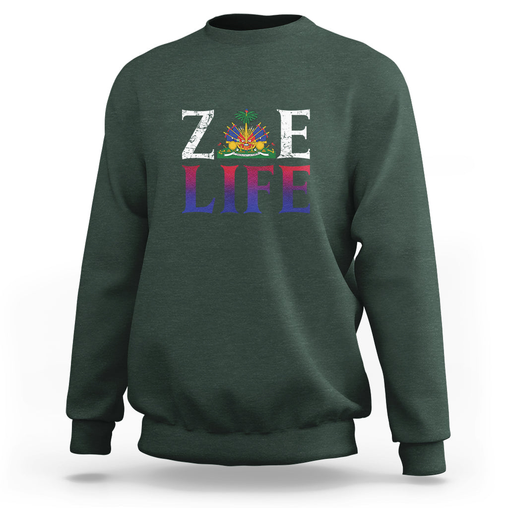 Dark green crewneck sweatshirt with 'ZOE LIFE' patriotic graphic on chest
