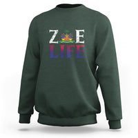 Dark green crewneck sweatshirt with 'ZOE LIFE' patriotic graphic on chest