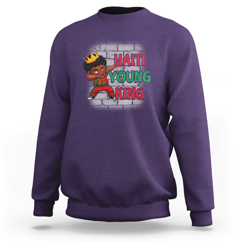 Purple kids sweatshirt with “HAITI YOUNG KING” graphic and cartoon character on front