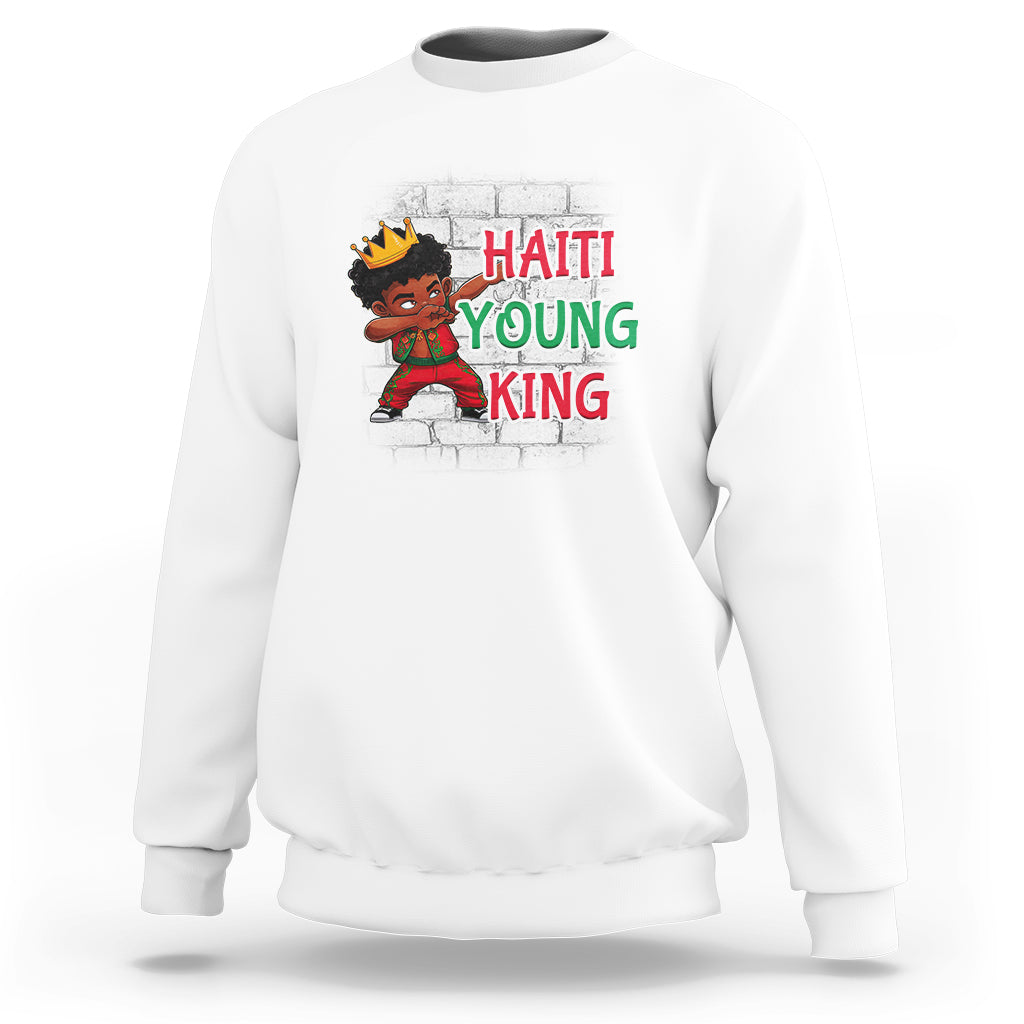 White kids sweatshirt with “HAITI YOUNG KING” graphic and cartoon character on front